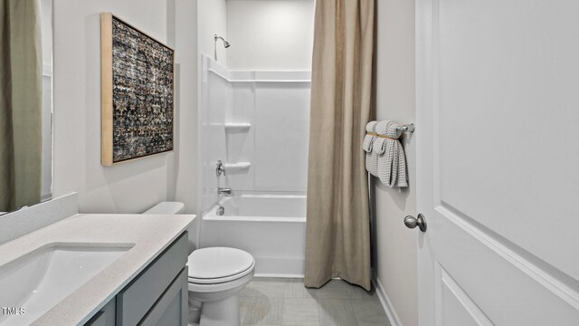 full bathroom with shower / bath combo, vanity, and toilet