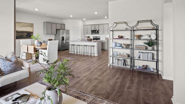 living room featuring dark hardwood / wood-style floors