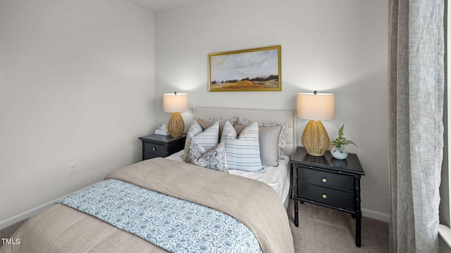 carpeted bedroom with baseboards