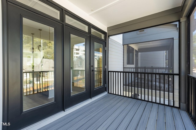 wooden terrace featuring french doors