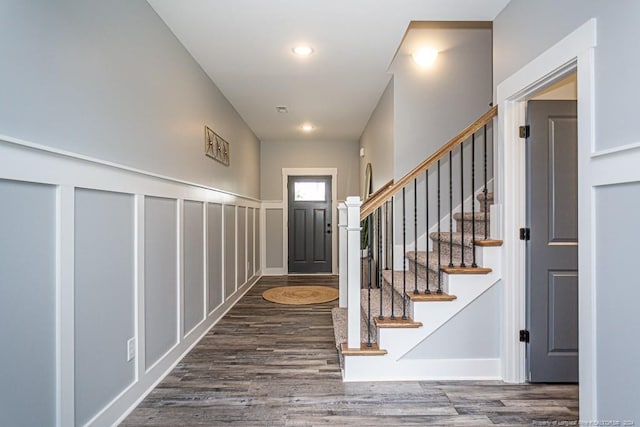 entryway featuring stairs, wood finished floors, and recessed lighting