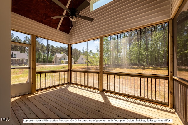 unfurnished sunroom featuring lofted ceiling and ceiling fan