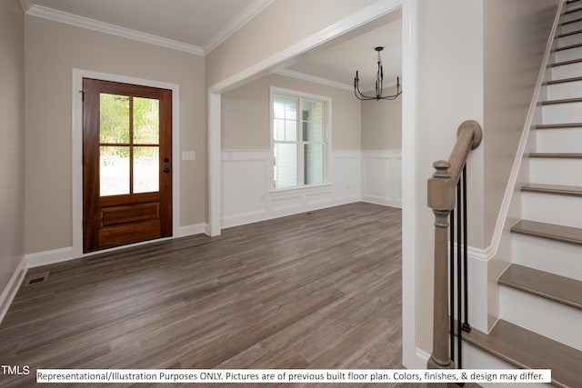 foyer featuring a notable chandelier, crown molding, and dark hardwood / wood-style flooring