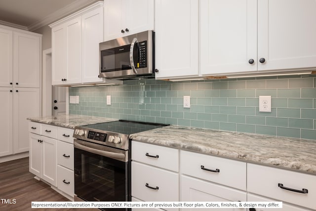 kitchen with crown molding, stainless steel appliances, light stone countertops, dark hardwood / wood-style floors, and white cabinetry