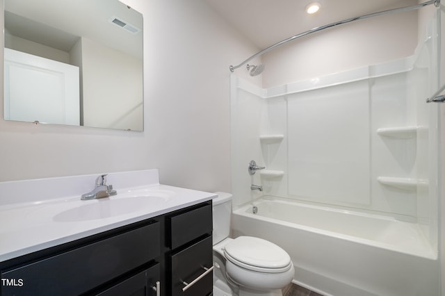 full bathroom featuring vanity, toilet, and shower / tub combination