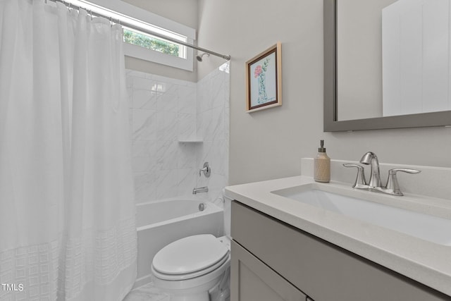 full bathroom with vanity, toilet, and shower / bath combo with shower curtain