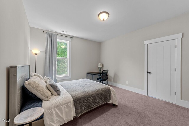 bedroom featuring carpet flooring