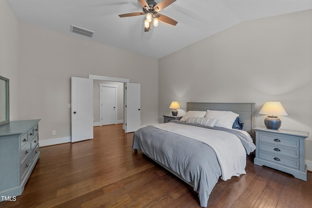 bedroom featuring lofted ceiling, ceiling fan, and dark hardwood / wood-style flooring