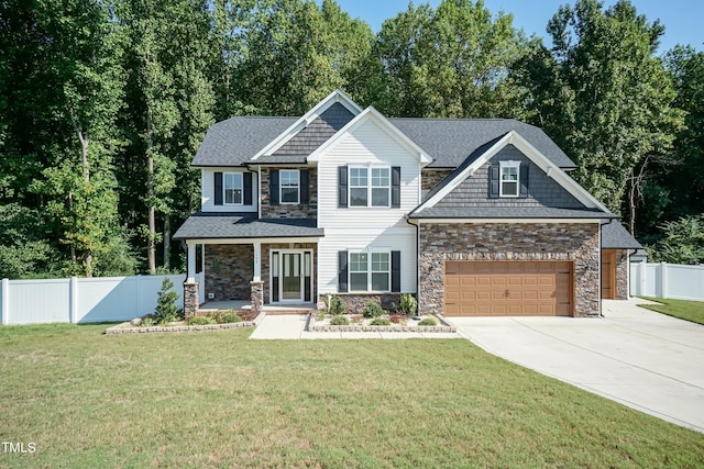 159 Shady Oaks Dr, Benson, NC 27504 - craftsman-style house with stone siding, fence, concrete driveway, a front lawn, and a porch
