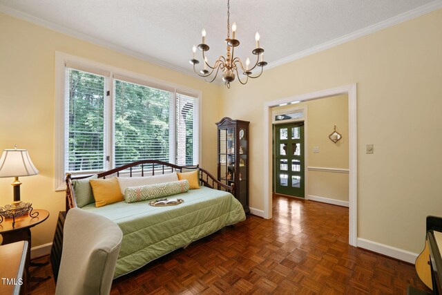 bedroom featuring a textured ceiling, crown molding, an inviting chandelier, and dark parquet flooring