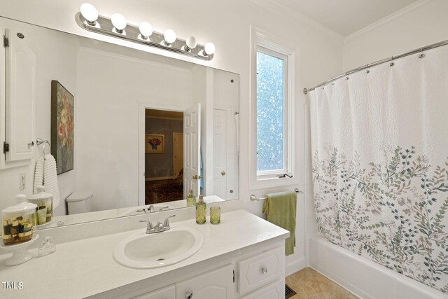 full bathroom featuring vanity, shower / tub combo, crown molding, toilet, and tile patterned floors