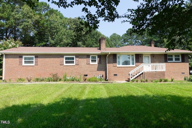 ranch-style house featuring a front yard