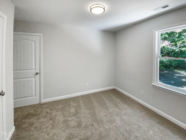 view of carpeted spare room