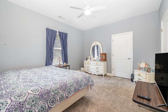 carpeted bedroom featuring ceiling fan