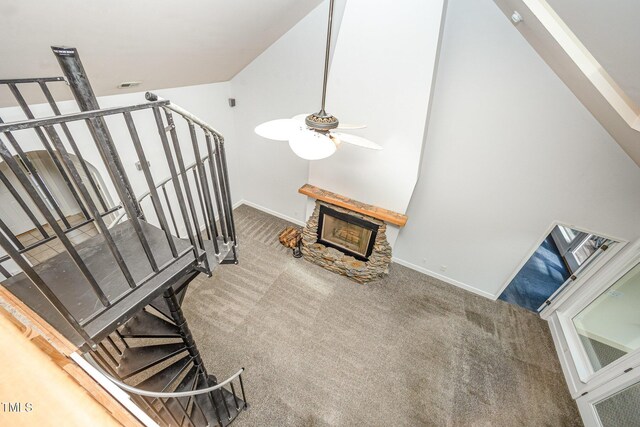 3313 Overhead Ct, Willow Springs, NC 27592 - stairway featuring carpet flooring, a ceiling fan, and a stone fireplace