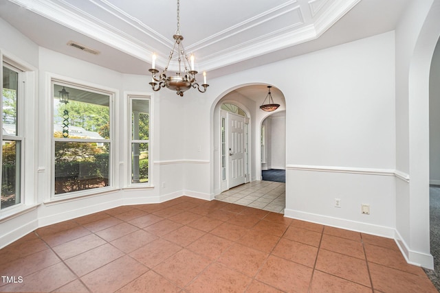 3313 Overhead Ct, Willow Springs, NC 27592 - tiled empty room featuring arched walkways, a tray ceiling, ornamental molding, and a chandelier
