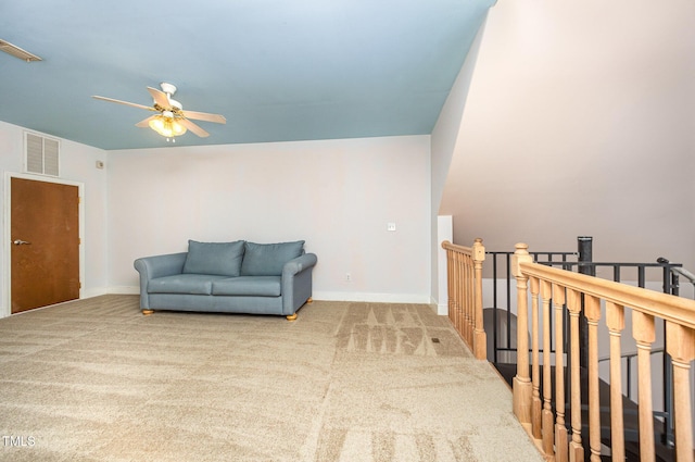 3313 Overhead Ct, Willow Springs, NC 27592 - sitting room featuring ceiling fan, carpet, and an upstairs landing