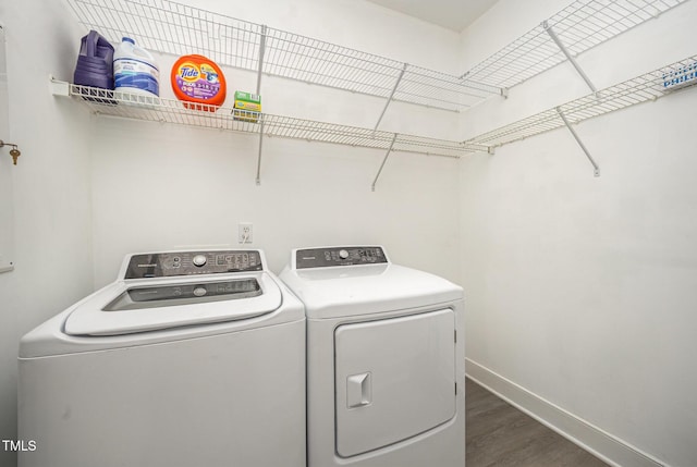 3313 Overhead Ct, Willow Springs, NC 27592 - washroom with washing machine and clothes dryer and wood finished floors