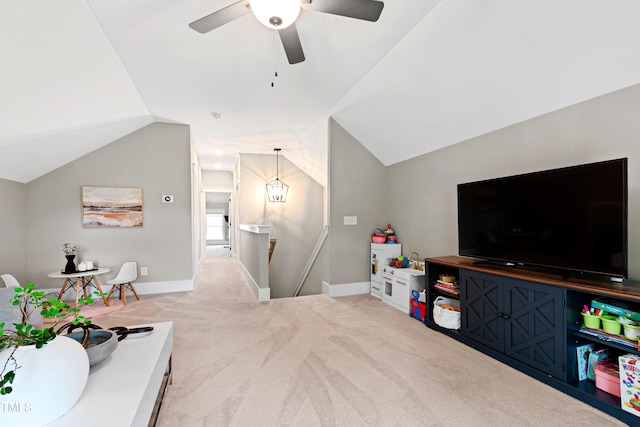 game room featuring lofted ceiling, ceiling fan, and carpet flooring