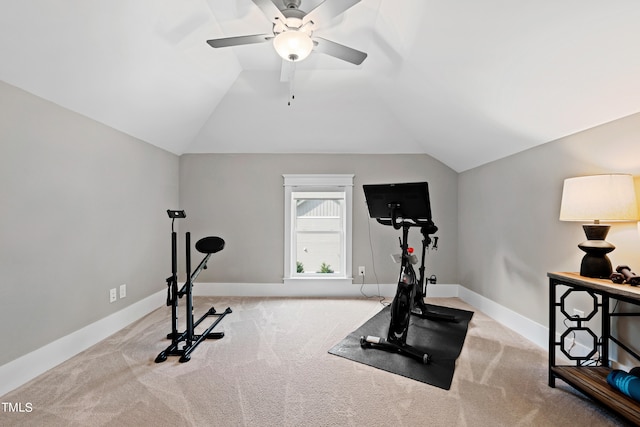 workout area featuring light carpet, vaulted ceiling, and ceiling fan