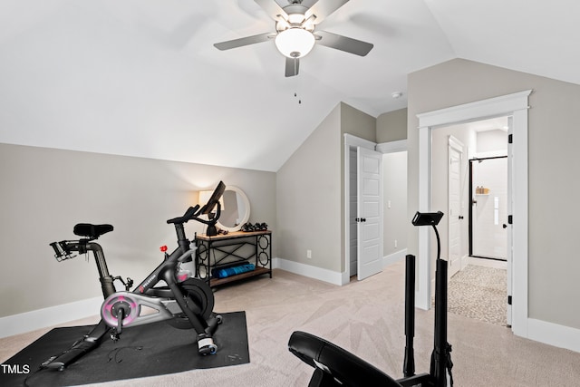 workout room featuring ceiling fan, light colored carpet, and lofted ceiling