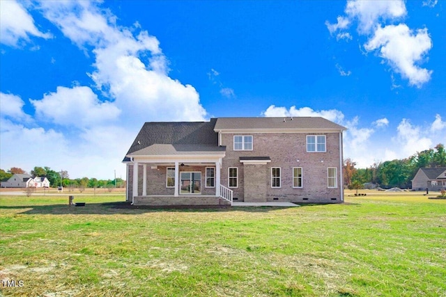 46 Otter Hole Dr, Kenly, NC 27542 - rear view of property featuring brick siding, ceiling fan, crawl space, a patio area, and a lawn