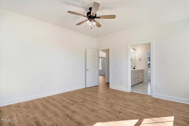 46 Otter Hole Dr, Kenly, NC 27542 - unfurnished bedroom featuring baseboards, ornamental molding, light wood-type flooring, and ensuite bath