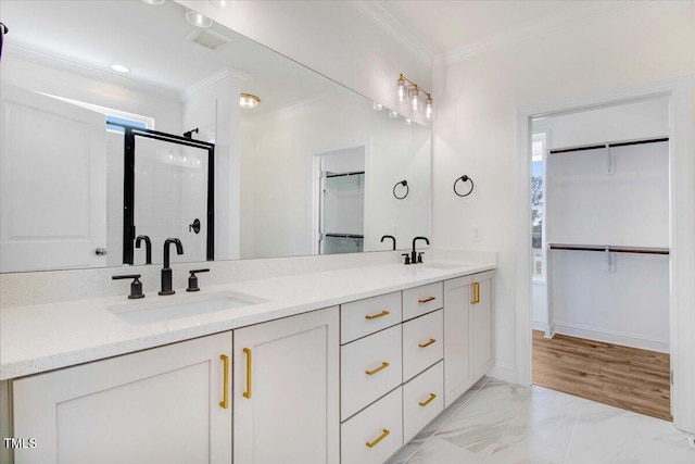 46 Otter Hole Dr, Kenly, NC 27542 - bathroom featuring crown molding, a sink, double vanity, and a shower stall