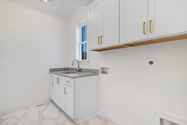 46 Otter Hole Dr, Kenly, NC 27542 - laundry area with cabinet space, a sink, hookup for a washing machine, electric dryer hookup, and baseboards