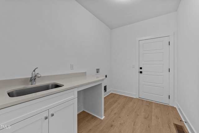 laundry area featuring hookup for a washing machine, cabinet space, visible vents, hookup for an electric dryer, and a sink