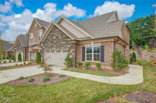 craftsman-style house featuring a garage, brick siding, stone siding, concrete driveway, and roof with shingles