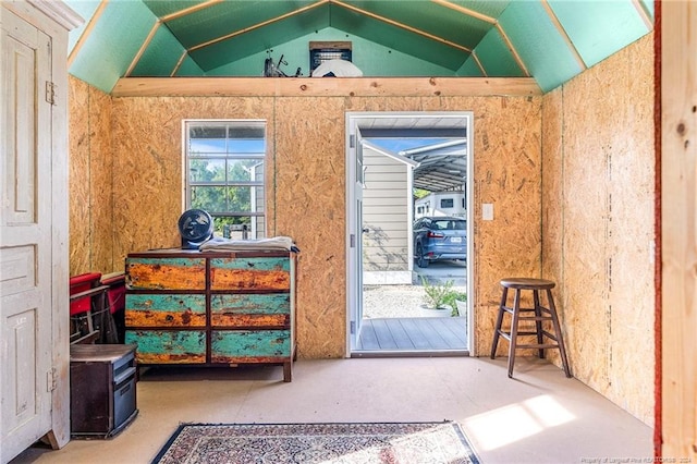 interior space featuring vaulted ceiling