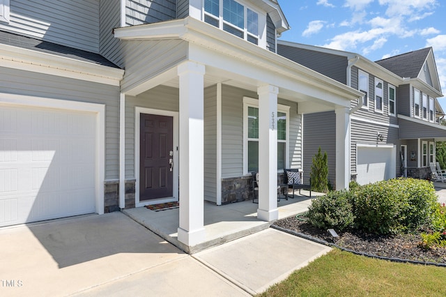 entrance to property featuring a porch