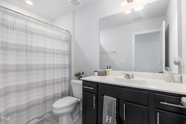 bathroom featuring vanity, a shower with curtain, and toilet