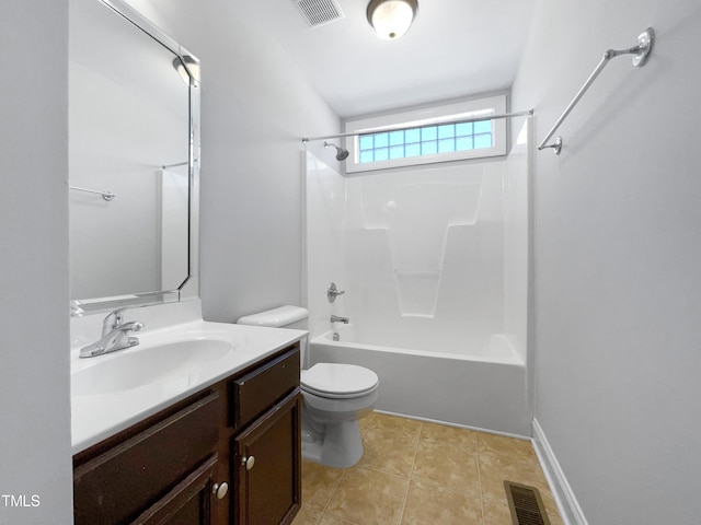 full bathroom with washtub / shower combination, tile patterned flooring, toilet, and vanity