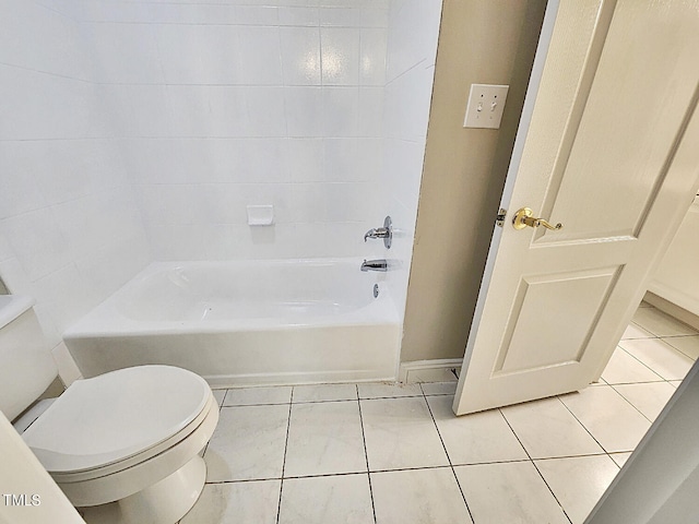 bathroom featuring toilet and tile patterned floors