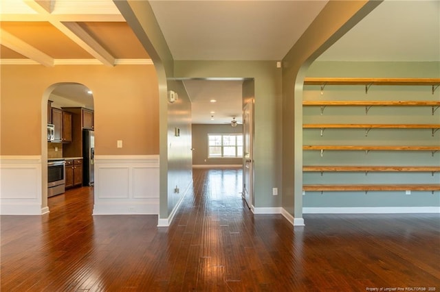 interior space featuring beamed ceiling and dark wood-type flooring