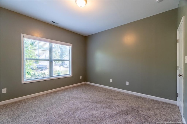 view of carpeted spare room