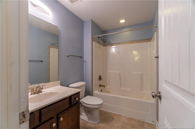 full bathroom featuring vanity, bathing tub / shower combination, and toilet