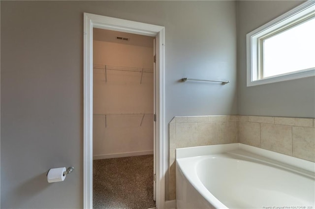 bathroom featuring a bathing tub