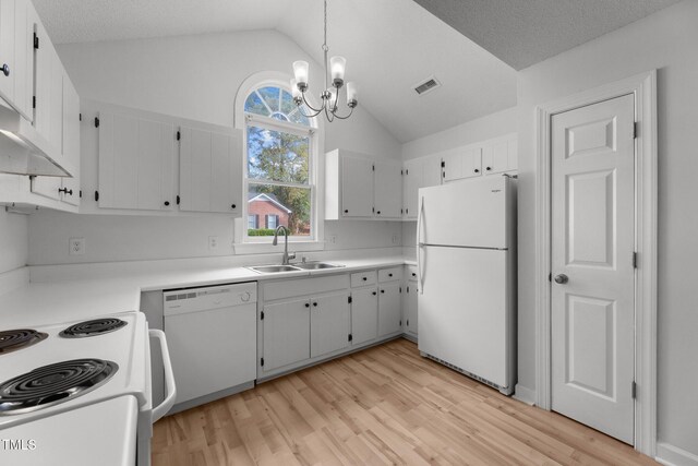 kitchen with white cabinetry, light hardwood / wood-style flooring, a chandelier, vaulted ceiling, and white appliances