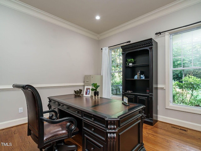 office featuring ornamental molding and hardwood / wood-style floors