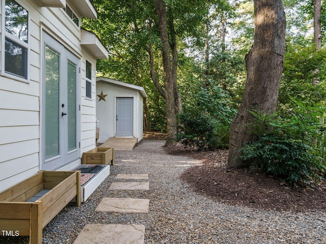 view of yard with french doors