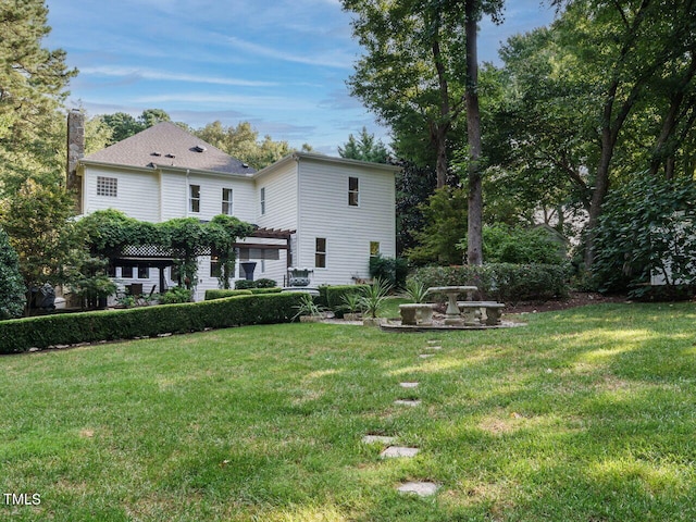 exterior space featuring a front yard