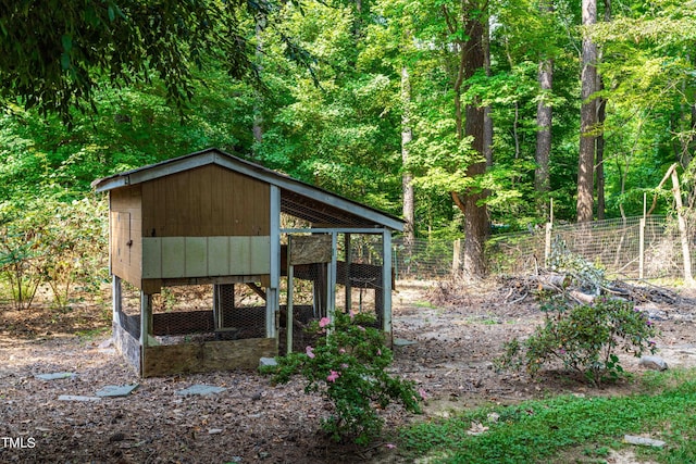 surrounding community featuring an outdoor structure