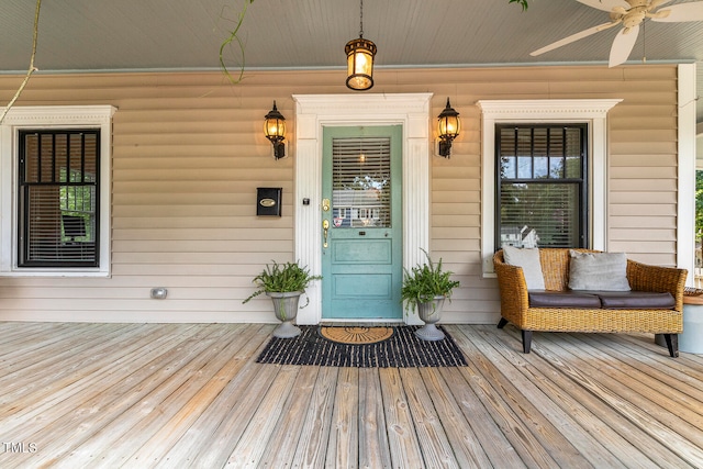 exterior space featuring ceiling fan