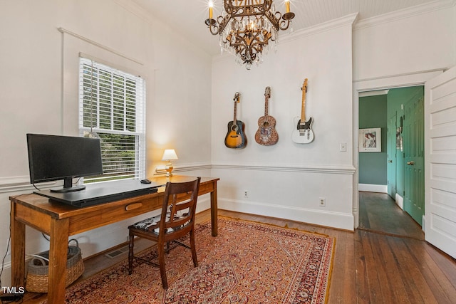 office space with an inviting chandelier, dark hardwood / wood-style floors, and ornamental molding