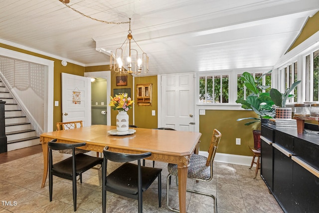 tiled dining room featuring an inviting chandelier, crown molding, and a healthy amount of sunlight