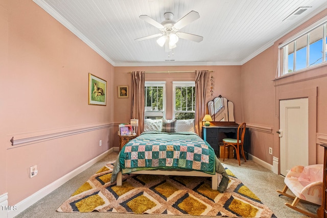 carpeted bedroom featuring crown molding, wood ceiling, and ceiling fan