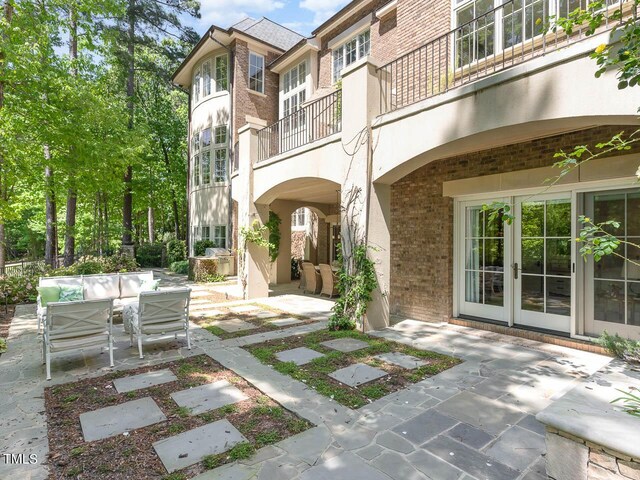 view of patio / terrace with a balcony